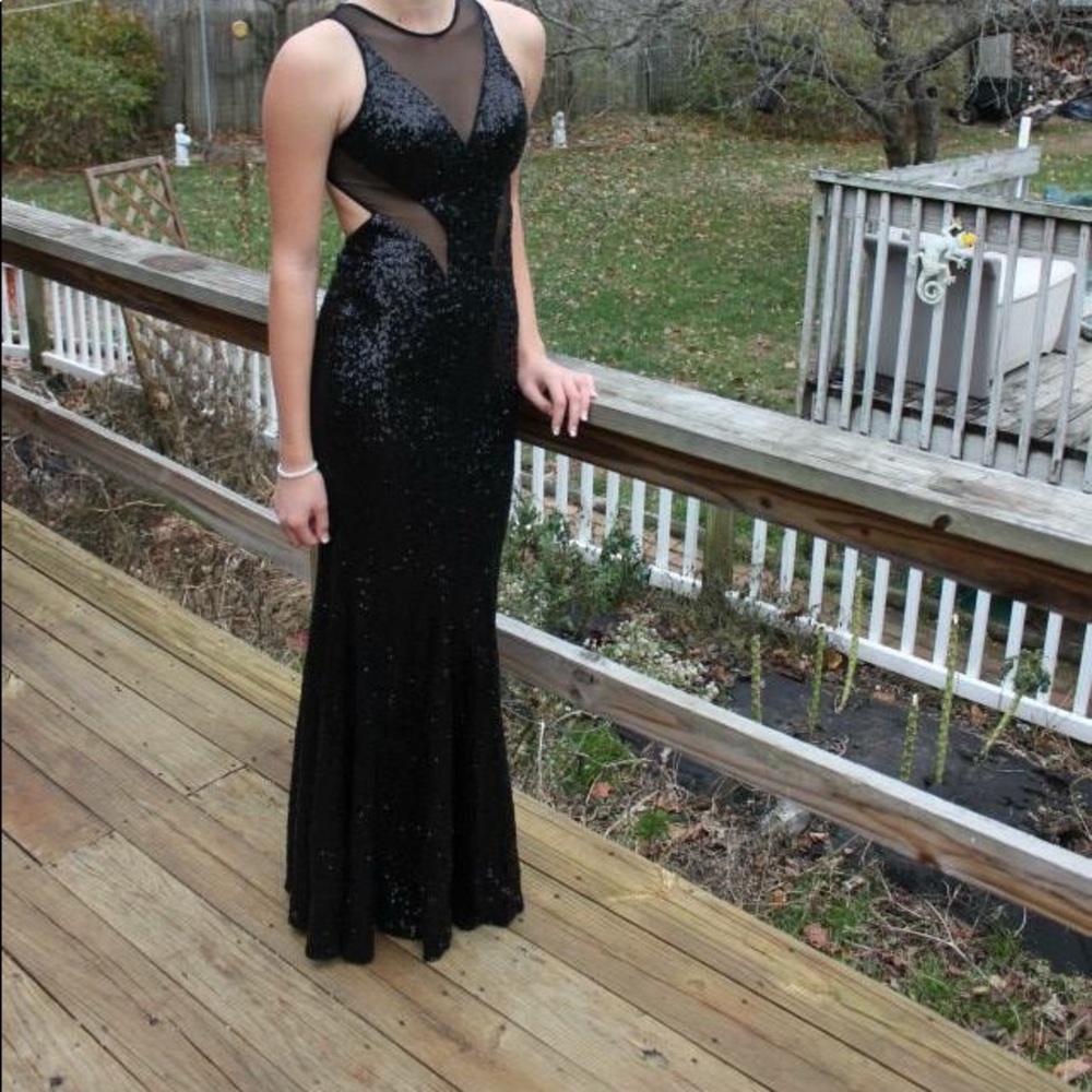 Black sequin prom dress with open cut back